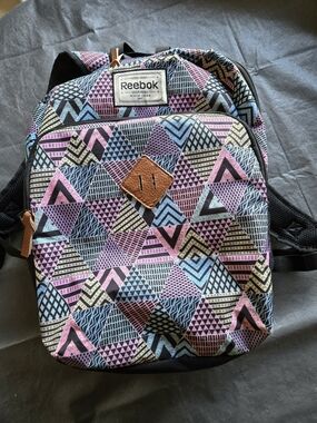 Reebok Pastel Geometric Triangle Print Backpack With Laptop Pocket